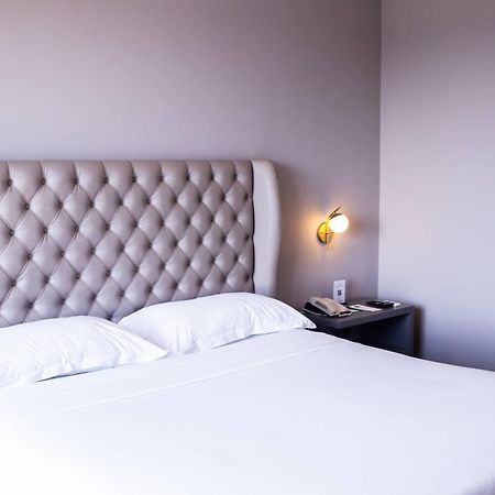 Ouro Minas Hotel Belo Horizonte, Dolce By Wyndham Ngoại thất bức ảnh A bedroom at the hotel